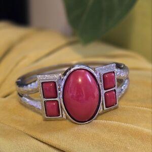 Silver bracelet with red stone